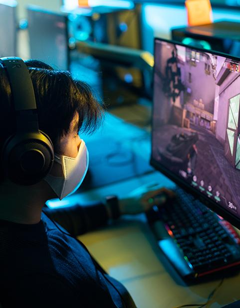 Photo of a student playing Valorant on a PC in SPSCC's eSports Facility
