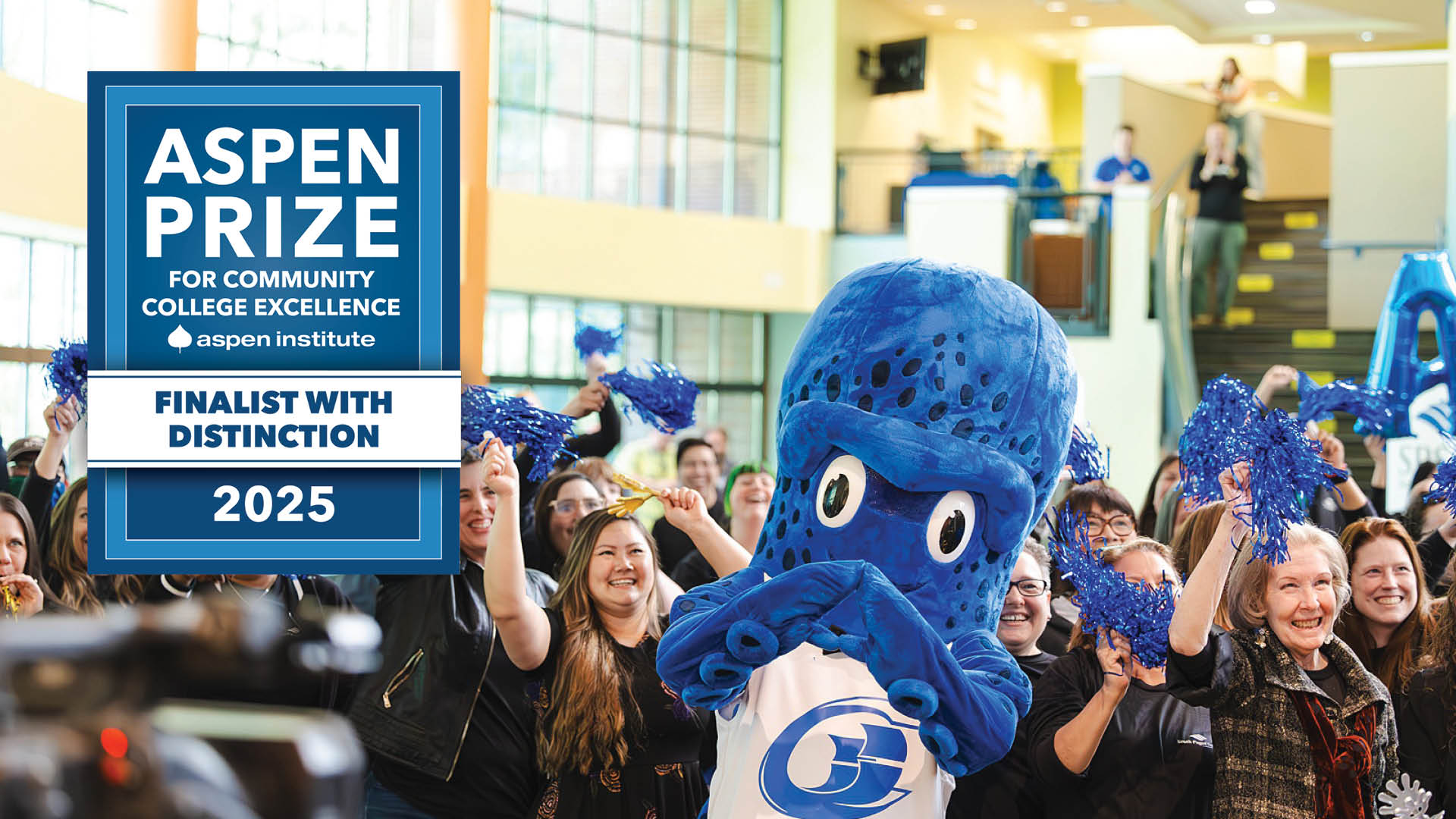 Percy the Kraken and SPSCC staff and faculty celebrating at the Aspen Ceremony