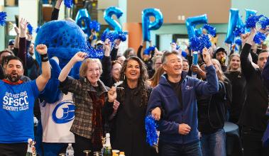 SPSCC staff, faculty, and community members cheering at the Aspen Watch Party