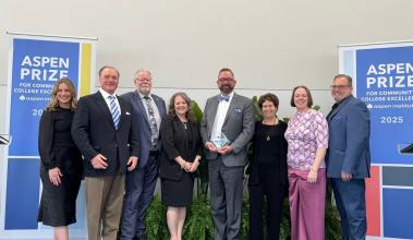 Dr. Stokes and the SPSCC DC Team accepting the Finalist with Distinction Aspen Prize.
