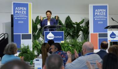 Speaker at podium at the Aspen Prize ceremony in Washington DC