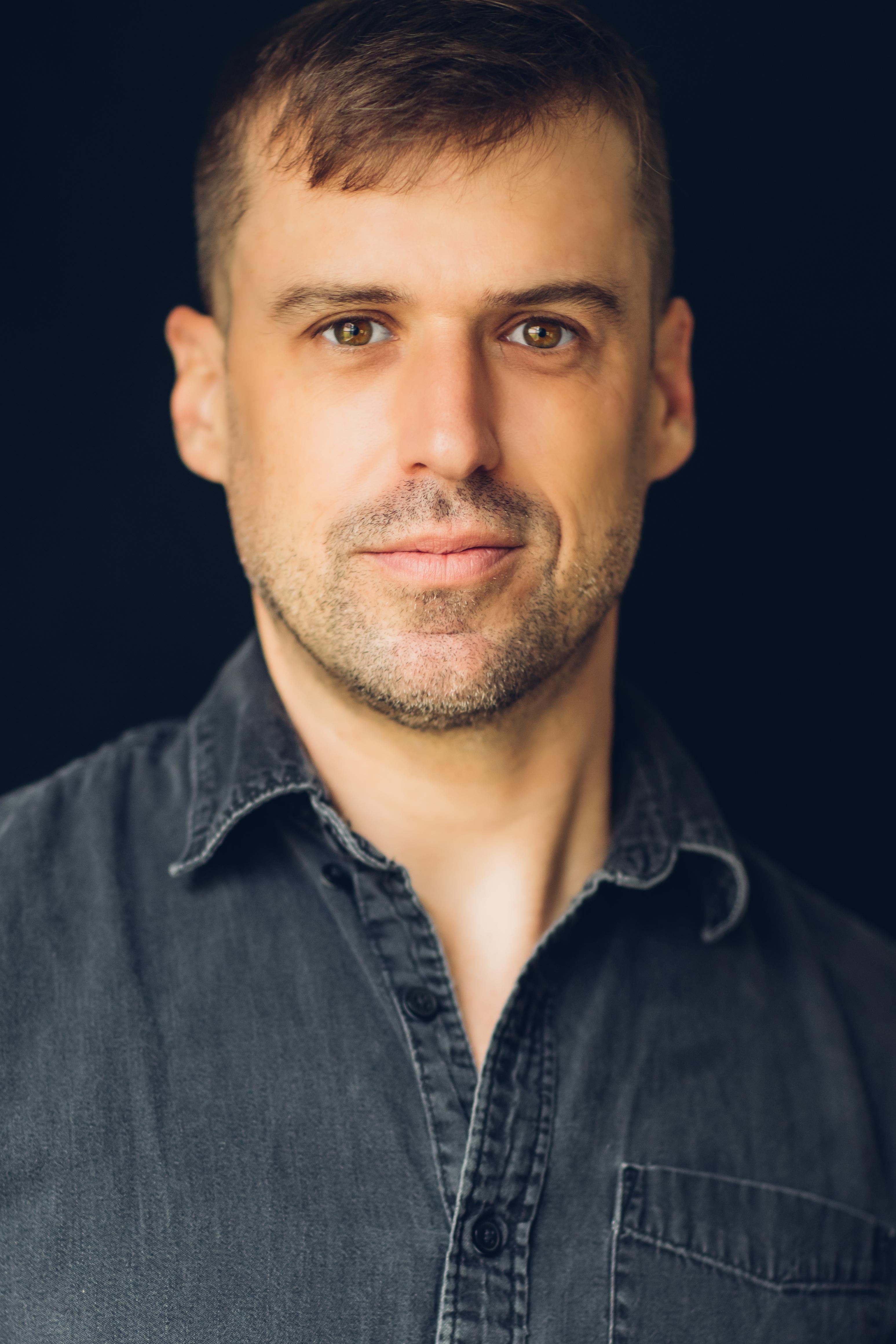 Eric Gibson. Caucasian male in casual dress.