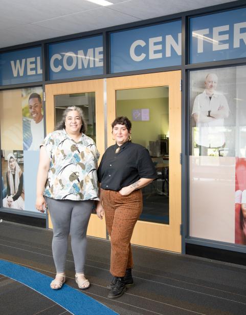 SPSCC staff members standing in front of the new Welcome Center in Bldg. 22