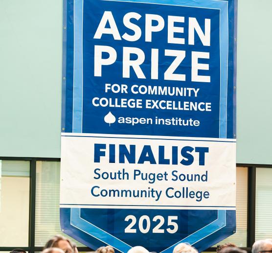 The 2025 Aspen Prize Finalist banner hanging in the SUB