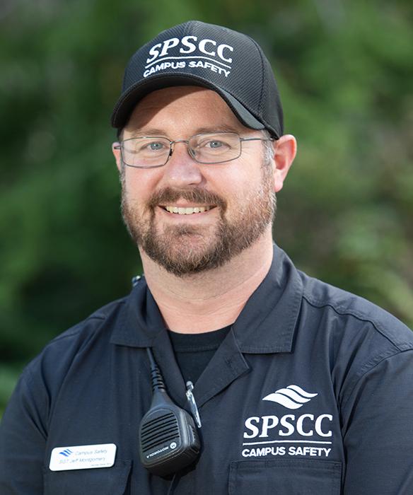 Campus Safety officer smiles in uniform