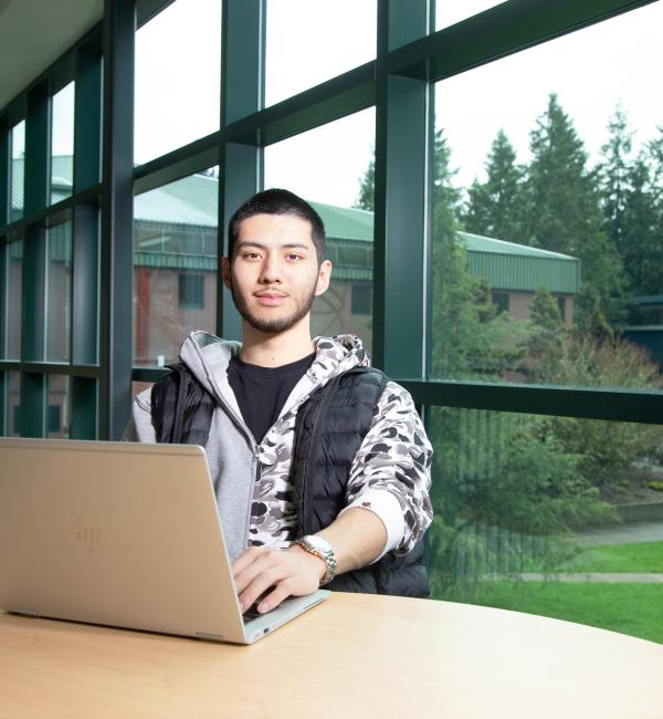 Student with Computer