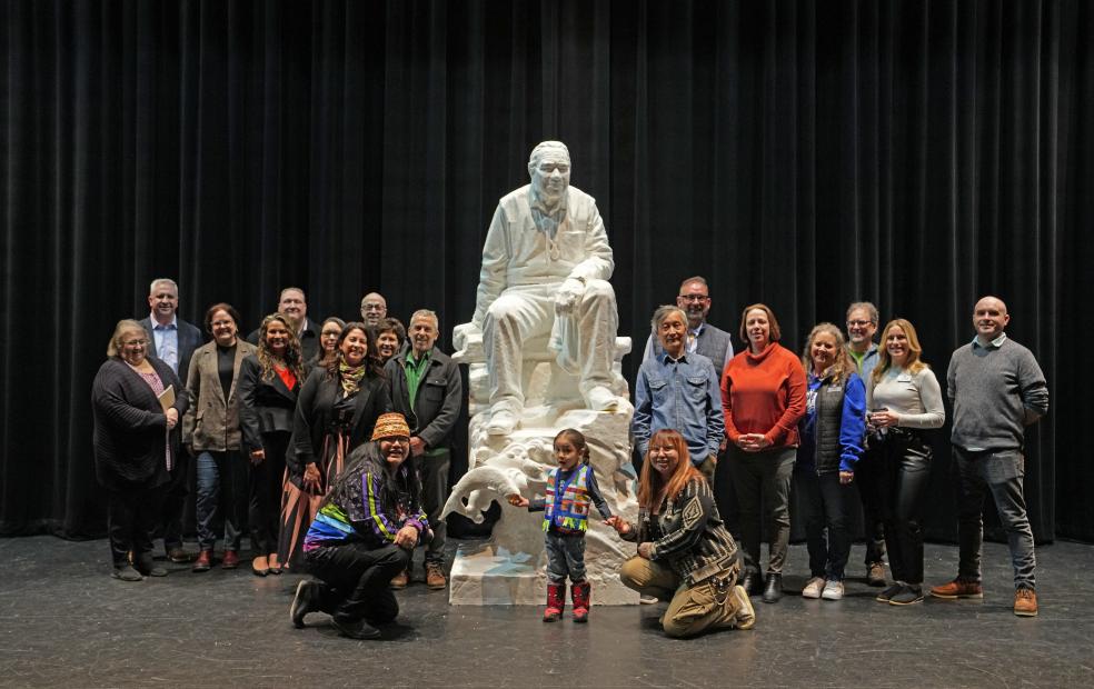 Mr. Wu, Nisqually Tribe members, and SPSCC staff in a group picture with the Billy Frank Jr. statue