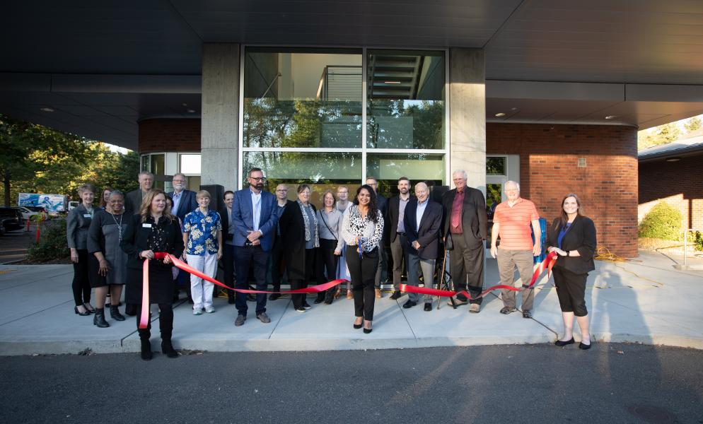 Photo of the ribbon-cutting held outside of the Bowen Center