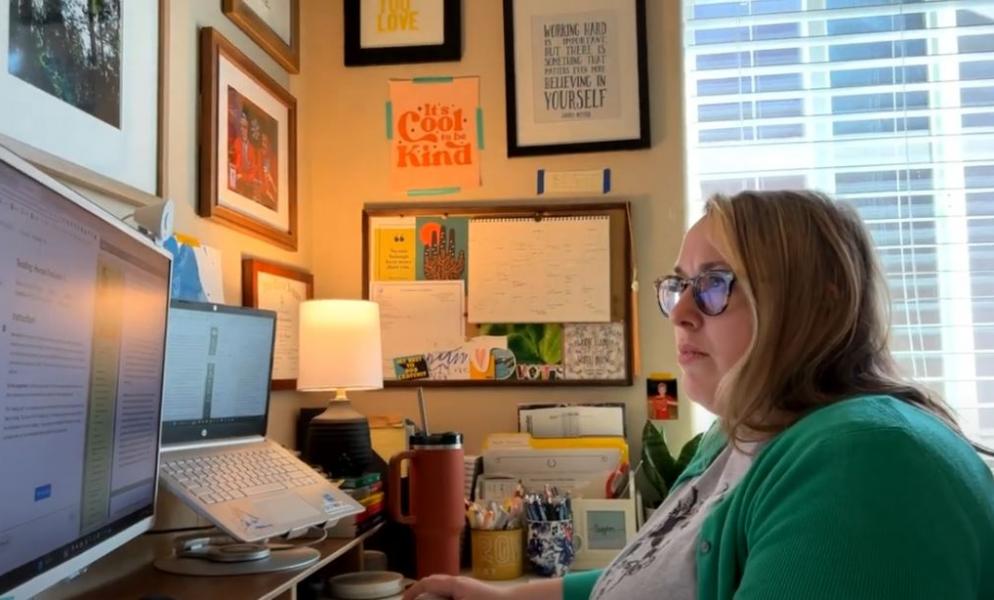 Kelsey Christensen-Abel working on homework at her home office