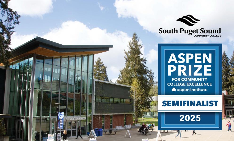 Outside of SPSCC's Building 22 with a badge that reads "Aspen Prize Semifinalist 2025"
