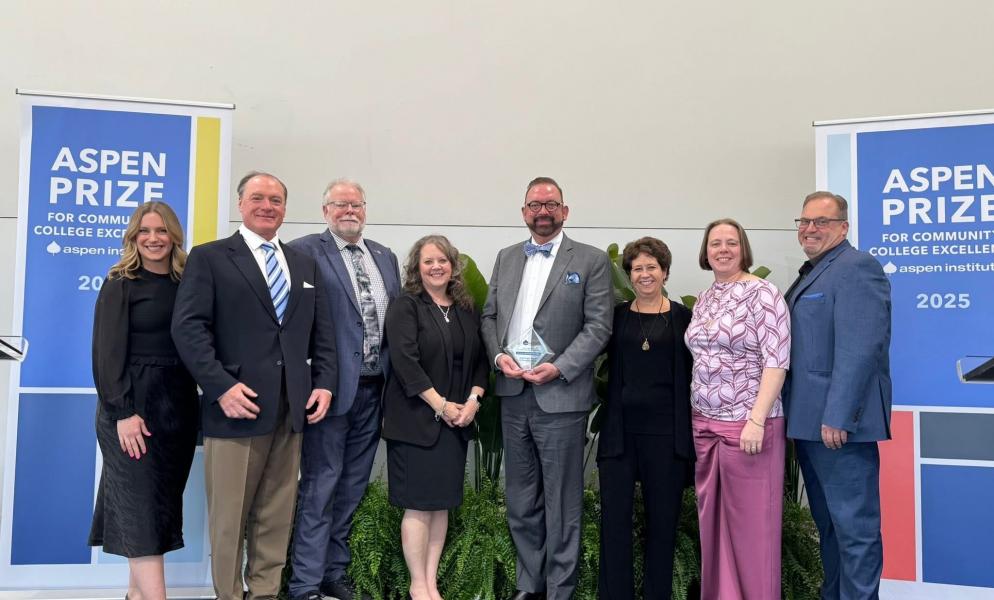 Dr. Stokes and the SPSCC DC Team accepting the Finalist with Distinction Aspen Prize.