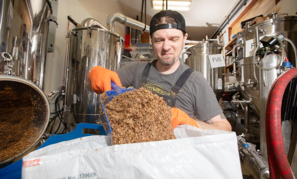 SPSCC alumnus Gavin Rainwater brewing a batch of beer