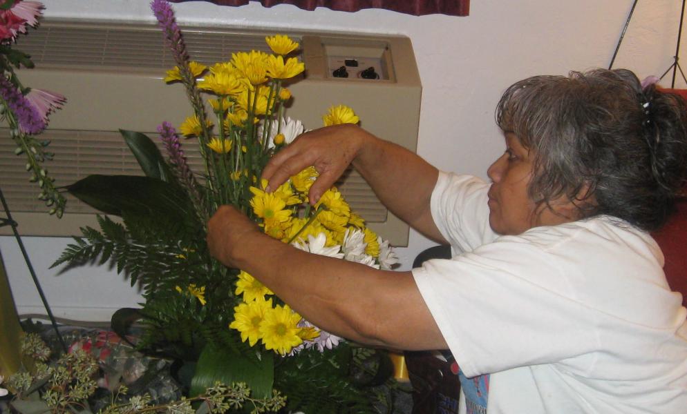 Fa'au'uga Tanielu Chipman arranging flowers